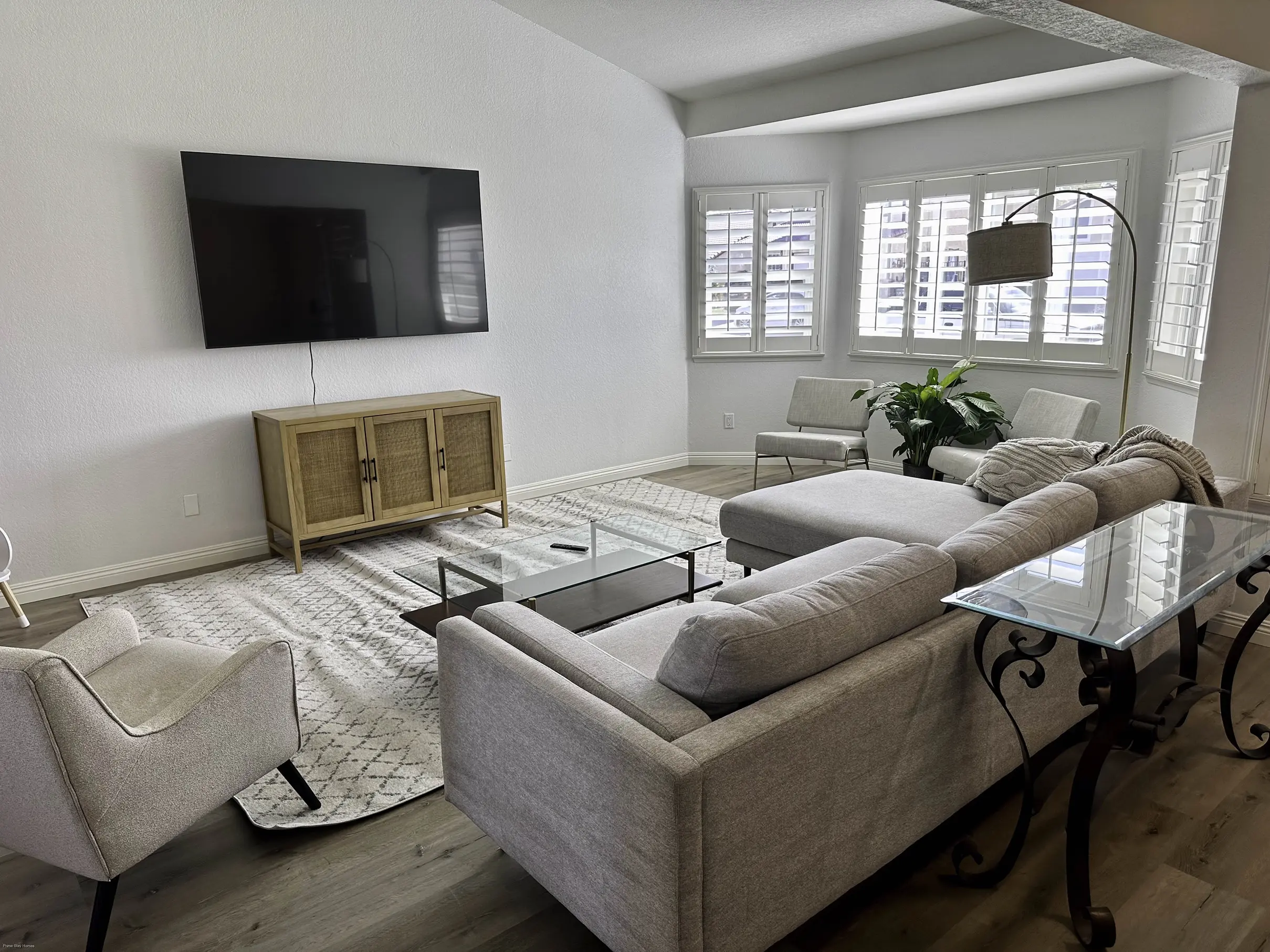 Family Room View 1 of a two-story home featuring four bedrooms and two and a half bathrooms - Lancaster Retreat House Rental, Prime Stay Homes Group ID: PSTH-749.