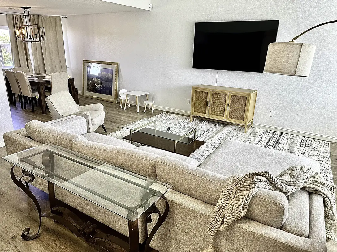 Family Room View 2 of a two-story home featuring four bedrooms and two and a half bathrooms - Lancaster Retreat House Rental, Prime Stay Homes Group ID: PSTH-749.