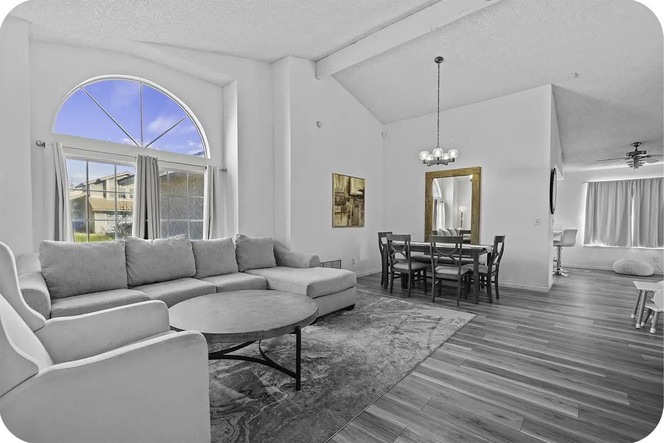 Living room with a large and modern furniture in Lancaster. This spacious house is available for rental through Prime Stay Homes Group, ID PSTH-. Image 109.